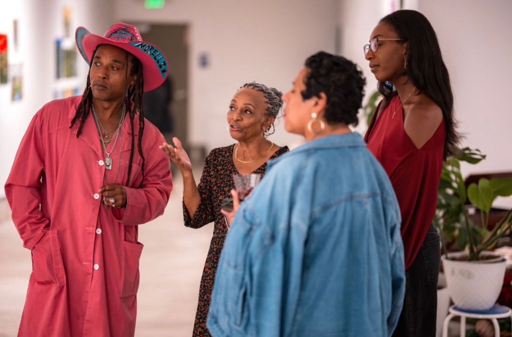 Carolyn Jordan-Sweeney’s talks art with collectors at her debut solo exhibition, Garden Seed African American women painters, black women painters, black women artists